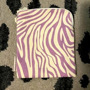 Dagne Dover Skye essentials pouch in purple zebra